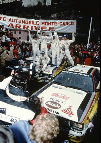 Walter Röhrl und sein Co-Pilot Christian Geistdörfer standen 1984 bei der Rallye Monte Carlo ganz oben auf dem Treppchen. Die Teams Blomqvist/Cederberg und Mikkola/Hertz sorgten mit den Plätzen zwei und drei für den legendären Dreifach-Sieg für Audi<br>Foto: Audi AG
